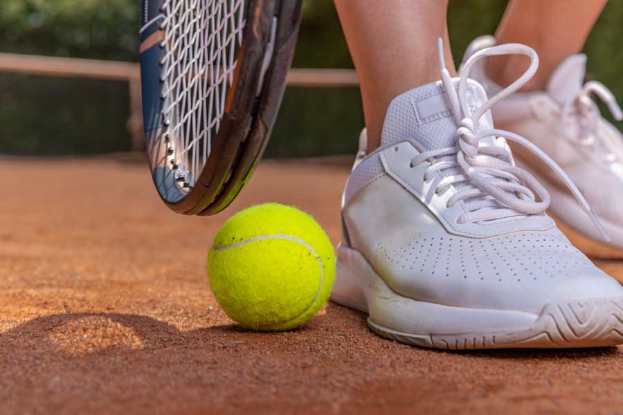 closeup tennis player shoes